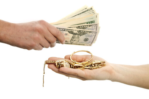 "Hand offers gold jewels, hand gives cash money."